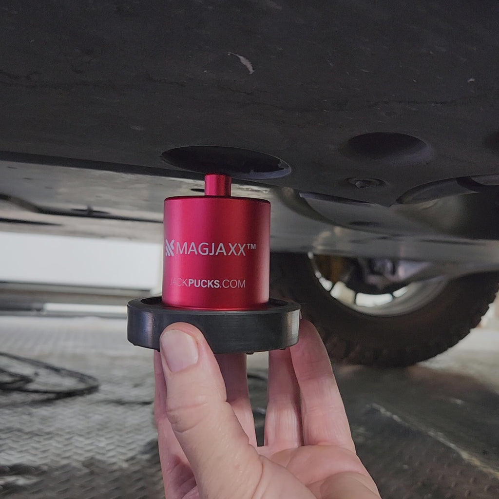 Demonstration of how our 5 Star Magnetic Jack Puck  firlmly locks onto the Rivian chassis.